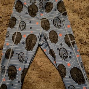 Feed Me Fight Me Death by weights leggings.